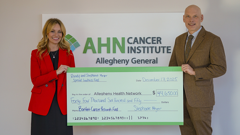 female nurse listens to lungs of older male patient